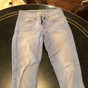 Designer skinny jeans with raw edge
